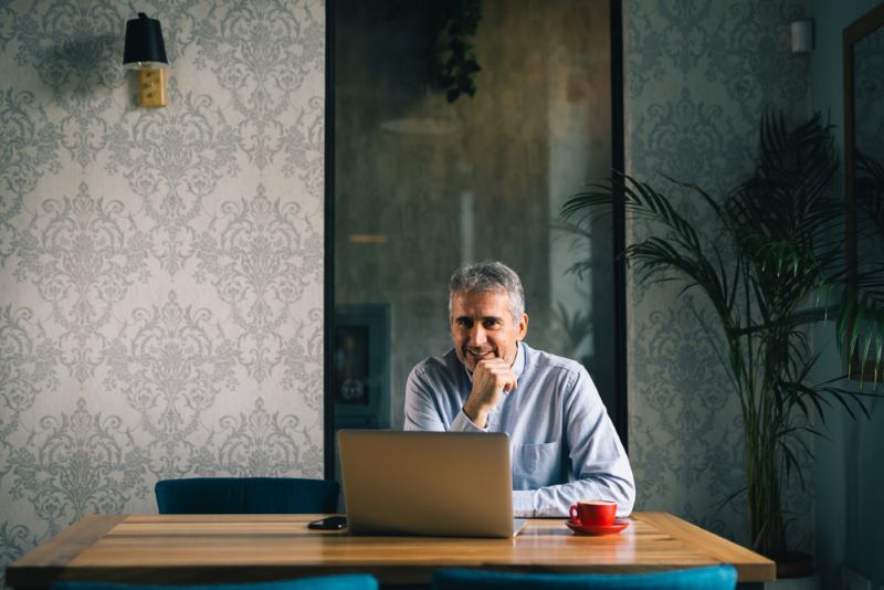 older man reading divorce information